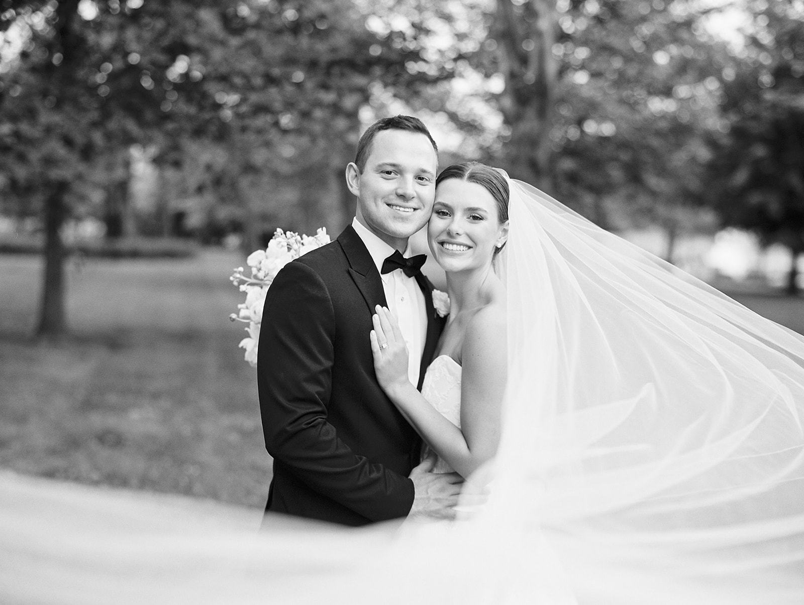 Madeleine and Andrew celebrating their spring wedding reception at the World’s Fair Pavilion in Forest Park, one of the most iconic wedding venues in STL MO, photographed by a Saint Louis wedding photographer, Kiley Ann Photography.